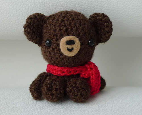 Brown bear with scarf