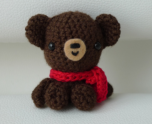 Brown bear with scarf
